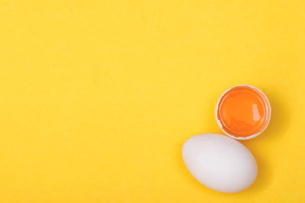 istock Top view egg yolk and egg white high protein good for body yellow background. 1480900823