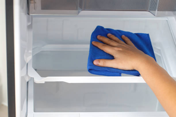 istock Employees use a cloth to clean the refrigerator. 1480900890