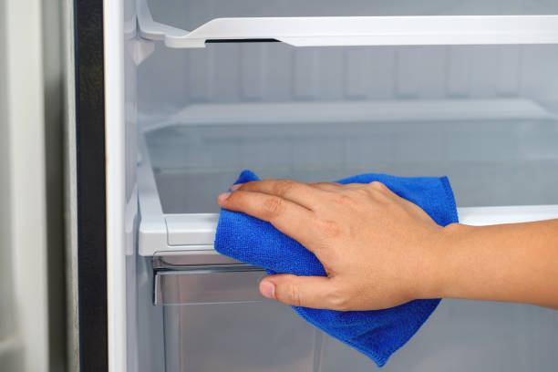 istock Employees use a cloth to clean the refrigerator. 1480900937