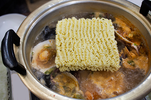 Local traditional korean gourmet food ramyun noodle seafood soup for korean people and foreign travelers travel visit and taste eat drinks cuisine in restaurant in Jeju do island, South Korea