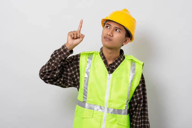 istock Young asian construction worker thinking and confused making decision isolated on white background 1480903588
