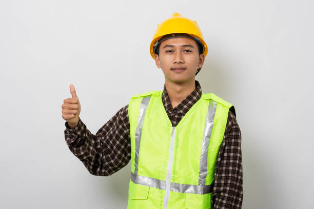istock Young asian construction worker showing thumb up gesture with positive expression isolated on white background 1480903632