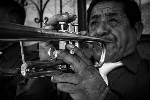 Jazz musician playing the trumpet.