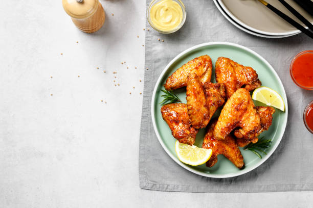 istock chicken wings glazed with hot chilli sauce 1480909681