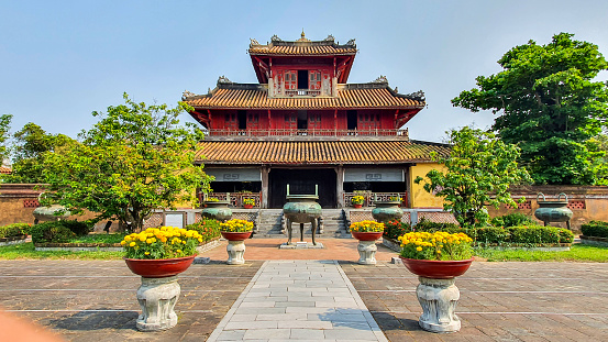 Hue, Vietnam - March 15, 2021: Hien Lam Pavilion In Front Of The Mieu Temple In Hue Imperial Citadel. The Imperial Citadel Of Hue, A UNESCO Cultural Heritage Is A Major Tourist Destination In Vietnam.