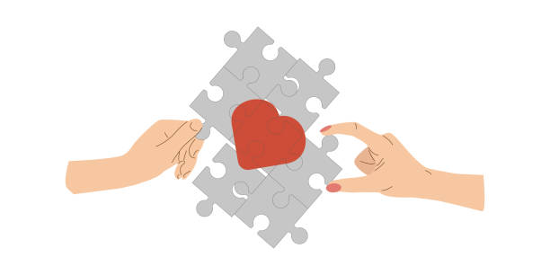istock Red heart in hands man and woman. 1480913257