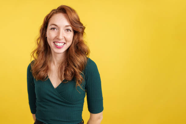 istock Happy readheaded woman smiling at the camera 1480920780