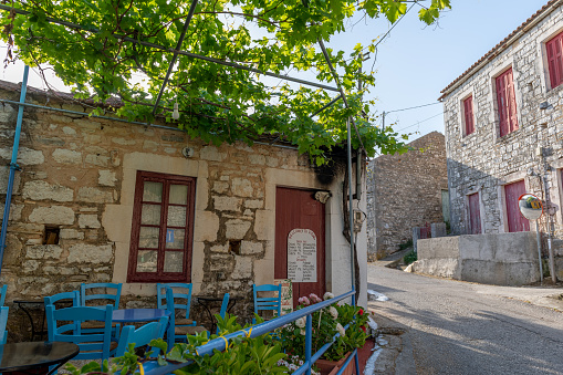 Ithaca Island, Greece-05.25.2022. Buildings on the hillside of Kioni village. A quiet, sleepy holiday destination.