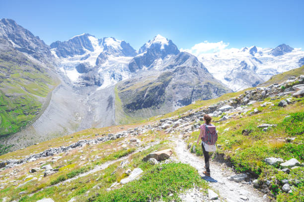 istock A woman alone walks on high mountain trail 1480925278