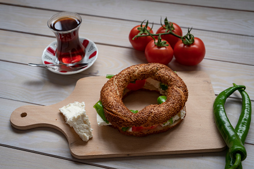 Turkish bagel with cheese, tomato, green pepper, tea