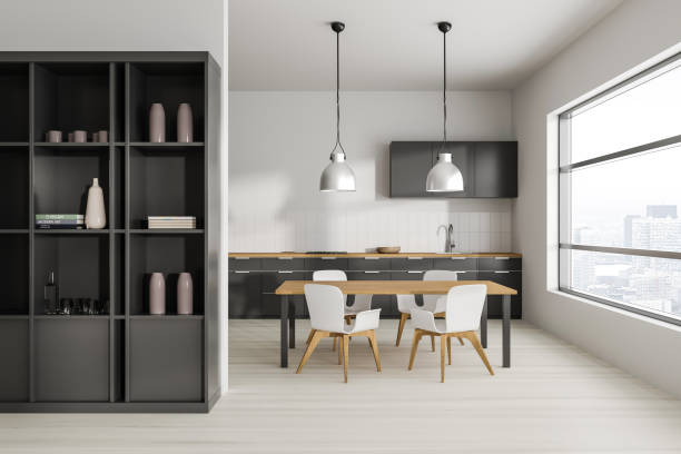 istock Stylish home kitchen interior with eating and cooking area, panoramic window 1480928919