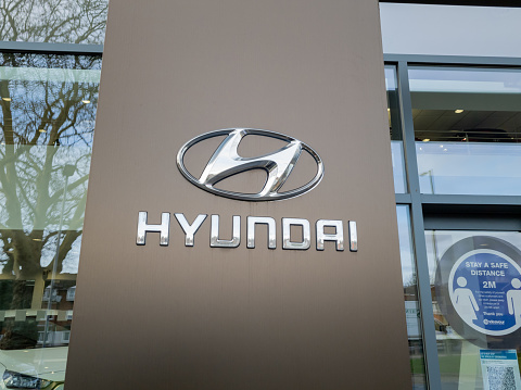 London. UK. 12.16.2020. A Hyundai Motors dealership bearing the South Korean vehicle manufacturer,s name sign and logo.