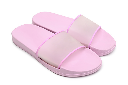 Pink rubber slippers on white background