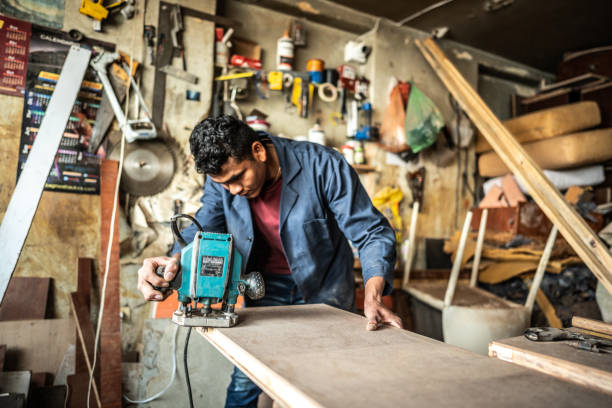 istock Portrait of a young carpenter working at carpentry 1480949551