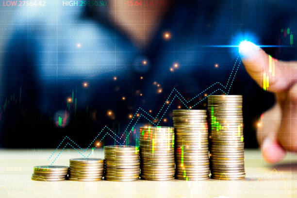 Coins are laid in graph.Business success concept wealth stock investment.Business in the digital age.Digital transformation for next generation technology.Technology is growing by leaps and bounds las monedas se colocan en el gráfico. concepto de éxito empresarial de inversión en acciones de riqueza. los negocios en la era digital. transformación digital para tecnología de próxima generación. la tecnología está creciendo a pasos agigantados