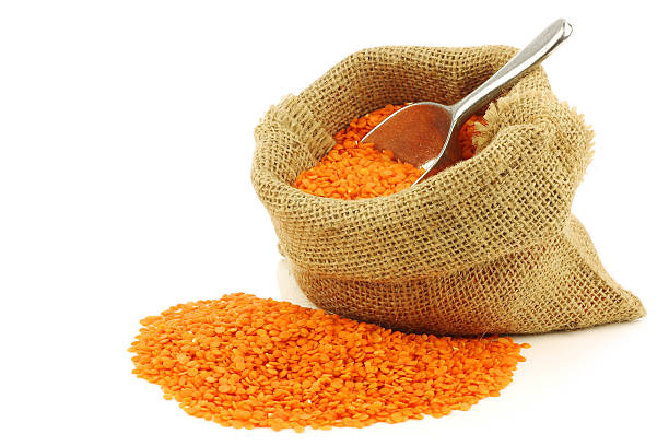 istock red lentils in a burlap bag with metal scoop 148095059