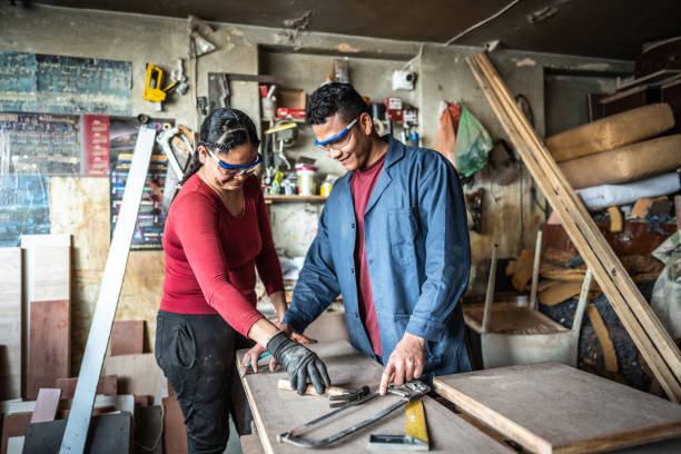 istock Mother and son working at carpentry 1480951271