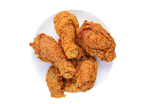 istock Plate of Delectable Golden Brown Crispy Fried Chickens Isolated on white background 1480953439