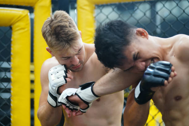 istock Mixed Martial Art, A powerful elbow that hits the opponent's face or head. Causing the opponent to have broken wounds, bleeding, may lose because of a wound that is fatal 1480953599