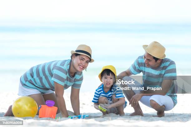 Happy Family Summer Sea Beach Vacation Asia Young people Lifestyle Travel Enjoy Fun And Relax Leisure Destination In Holiday Travel And Family Concept Stock Photo - Download Image Now