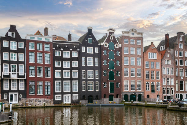 istock Amsterdam built along canal in central Amsterdam. Sunset Sky on the background. 1480956125