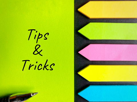 Tips and trick text on paper. Education and business concept.