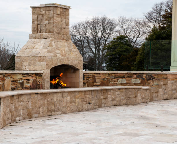 istock Stone patio with burning fireplace and copy space 1480965055