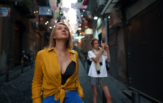 Two female tourists exploring the old town.