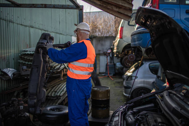 istock Male worker in an automotive junkyard 1480977826