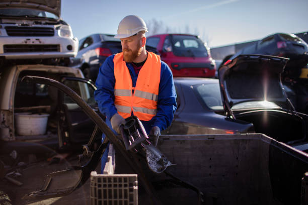 istock Male worker in an automotive junkyard 1480978009