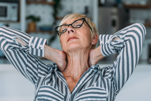istock Senior woman suffering from neckache. 1480979189