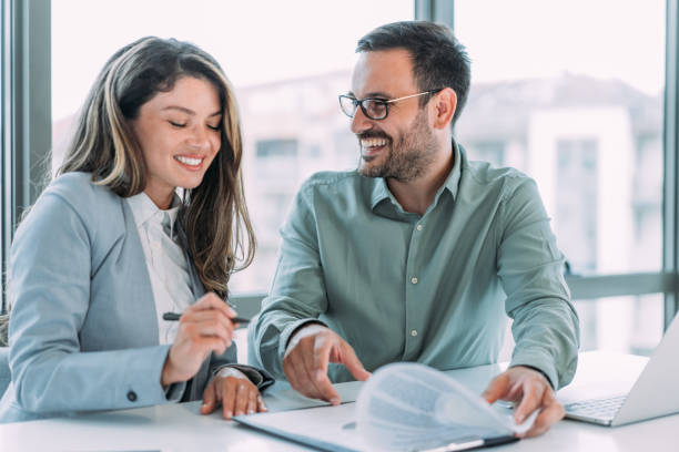istock Business people signing a contract in the office. 1480979215