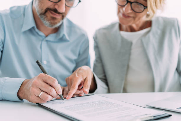 istock Business people signing a contract in the office. 1480979244