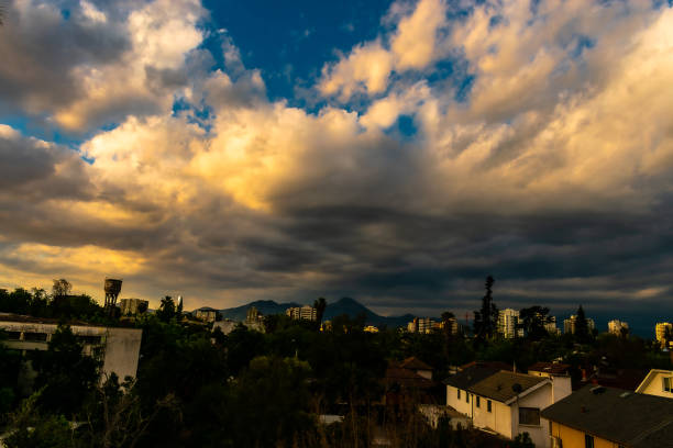 clouds in a dramatic sunset on a spring day in the city of santiago de chile