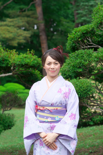 Japanese woman wearing a Kimono at Japanese Garden.