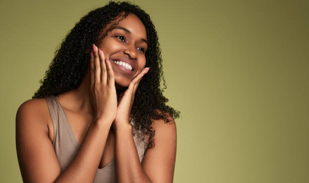 istock Happy black woman touching clean skin 1480981823