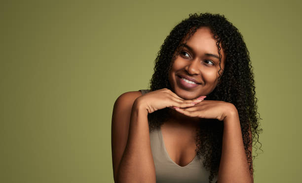 istock Young african american woman model looking away 1480981836