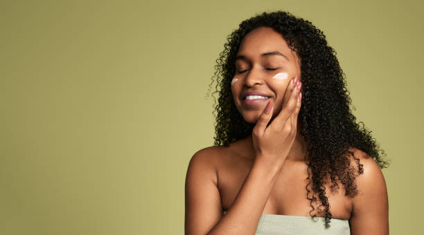istock Happy black lady smiling while enjoying self care routine after bath 1480981860