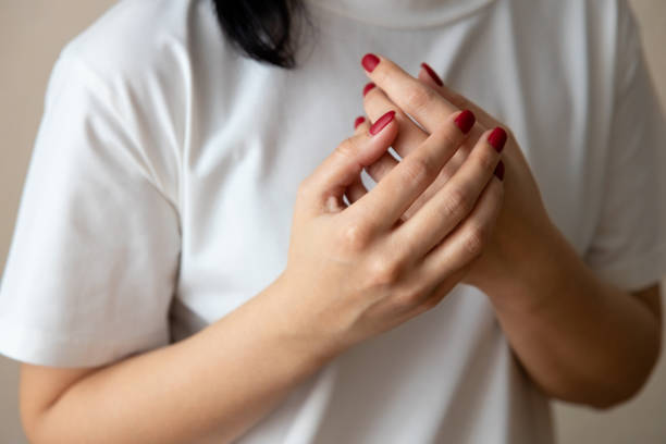 istock pain in the arm. Womens hands 1480981983