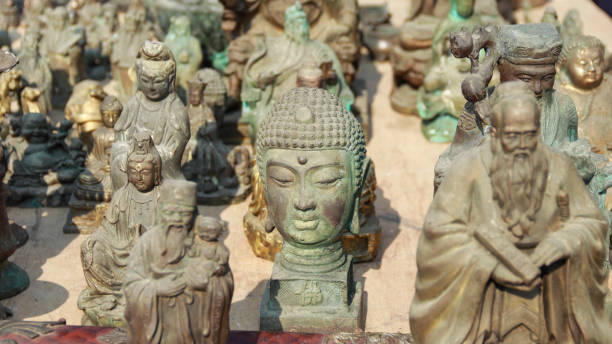 istock Buddha statues at the flea market 1480984030