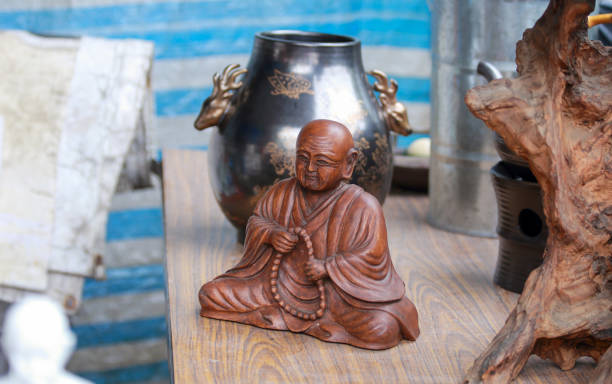 istock Buddha statues at the flea market 1480984106