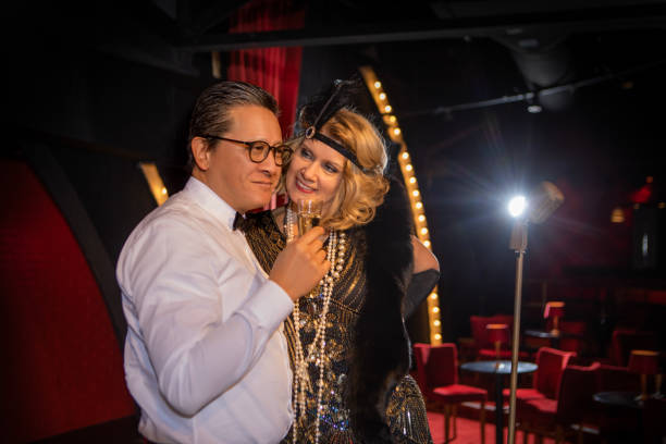Beautiful couple of performers singing on stage