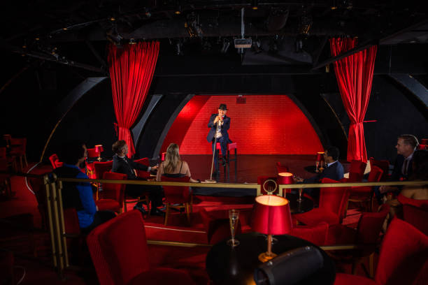 istock Handsome male singer on stage 1480991123