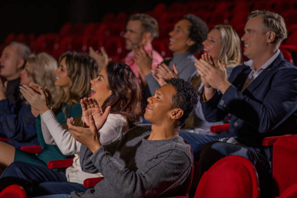 istock Small group of theatre going public at a performance 1480991508