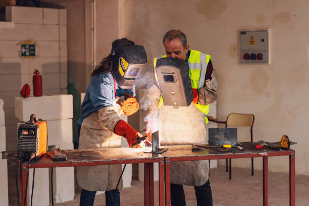 istock mature Woman Learning to Weld 1480993818