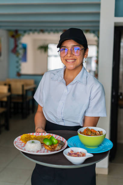 istock Food plate served with fish, rice and patacon 1480994400