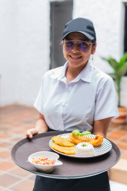 istock Food plate served with fish, rice and patacon 1480994451