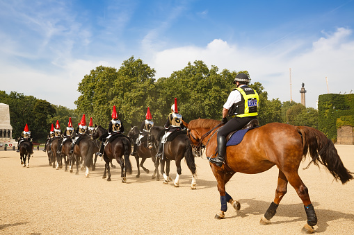 London, United Kingdom - September 6, 2021 - Changing The Queens Life Guard in the large square between Old Admiralty building and Admiralty House. Police keep order.