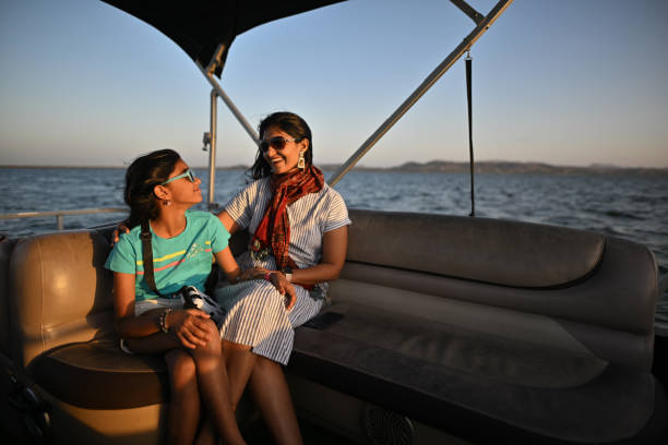 istock A mother having good time with her daughter on a boat ride. 1480998845