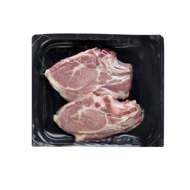 istock fresh pork bones in a plastic box with cut out isolated on white background have clipping path 1481000419